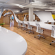 Illustration for article titled This gorgeous office has an endless desk made by robots